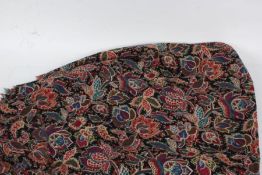 Liberty shawl, with brightly coloured flowers on a black ground, 124cm x 130cm approx.