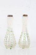 Pair of art glass vases, each with silver collars and spiral twist stems with green dots, 19.5cm (