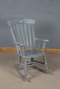 Shabby-chic blue painted rocking chair, with splat back rest and shaped armrests, 112cm tall
