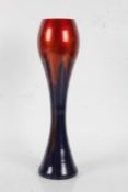 Ambiente Zwiesel art glass vase, with a running red glaze on navy/violet ground, 40cm tall