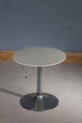 White circular topped occasional table, raised on a chrome stem and flared foot, 50cm diameter