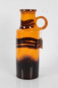West German pottery vase, with orange lava decoration on a brown ground, 28cm tall