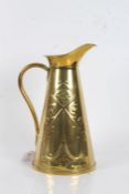 Art Nouveau brass jug, by J.S. & S., with stylised decoration, 29.5cm tall