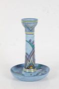 Carltonware 'Handcraft' candlestick, brightly decorated on a blue ground (damaged), 22.5cm tall
