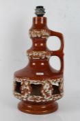 Mid 20th century Skandesco pottery lava table lamp, West German, with white effect lava on a treacle