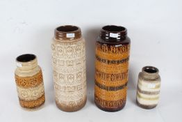 Four various West German pottery vases, three of cylindrical form, the other of square form, the