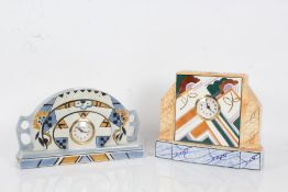 Two Art Deco pottery mantle clocks, each with brightly coloured patterns, one stamped 'Fabrique En