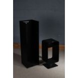 Two black metal log holders, 100cm tall and 58cm tall (2)
