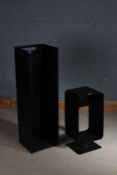 Two black metal log holders, 100cm tall and 58cm tall (2)