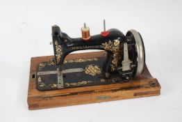 Reliance foreign cased sewing machine, with Bentalls of Kingston-On-Thamels label