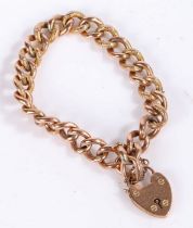 9 carat gold bracelet with a heart shaped locket, weight 14.8 grams
