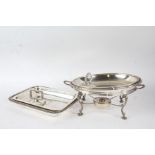 Silver plated chafing dish, of oval form, the lid with detachable handle and beaded rim, raised on a