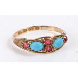 12 carat gold ring, the head set with turquoise and rubies, ring size P weight 1.2 grams