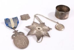 Silver, various dates and makers, to include Masonic medal, napkin ring, St. Christopher pendant,