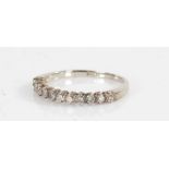 18 carat white gold half hoop eternity ring, set with twelve diamonds, ring size K1/2, 1.6g