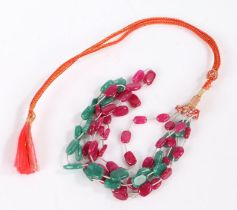 Indian style necklace set with three rows of stone two sets of pink colour stones and one green