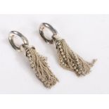 Pair of white metal earrings of modernist style with tassels