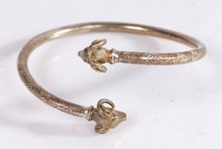 Silver bracelet, the terminals modelled as two rams heads
