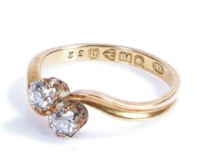 18 carat gold and diamond ring, the head set with two diamonds, ring size J weight 2.5 grams