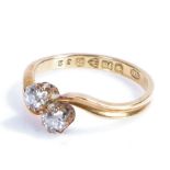 18 carat gold and diamond ring, the head set with two diamonds, ring size J weight 2.5 grams