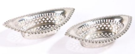 Pair of Edward VII oval silver dishes, Birmingham 1905, maker Henry Williamson ltd. the embossed
