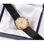 Garrard 9 carat gold cased wristwatch, the silvered dial with Arabic and baton marks together with a