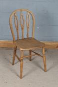 Single Gothic revival chair, having solid elm seat with bowed back rest with pierced splats,