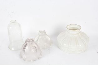 Pair of glass shades with pinched rims, together with a milk glass shade and a bell shaped shade