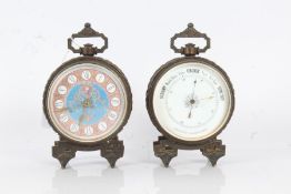 Early 20th century brass cased clock and barometer set, the clock having pink, white and blue enamel