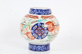 Chinese porcelain lantern vase, decorated in blue and iron red on a white ground, with bird and