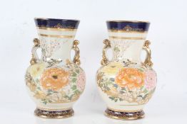 Pair 19th century Japanese porcelain vases, with brightly coloured blossoming flowers and