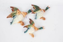 Set of three Beswick graduating flying mallard ducks, (two AF) (3)