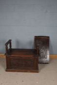 20th century oak monk's bench, with foliate carved decoration and hinged seat, 89cm wide