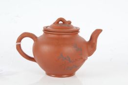 Chinese terracotta teapot, decorated with branches, having lift up lid and filter, character marks