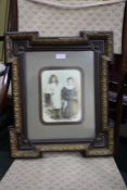 Victorian portrait on porcelain, painted with a young boy and girl, the boy dressed as a sailor,