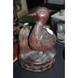 1930's carving in the form of a duck, initialled HJG and dated 1931 to the back, 37cm tall