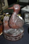 1930's carving in the form of a duck, initialled HJG and dated 1931 to the back, 37cm tall