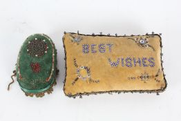 Two bead embroidered pin cushions, one reading "Best Wishes" the other "Angela", (2)