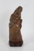 Chinese carved bamboo figure depicting an elder with fly whisk to his right hand and ruyi sceptre