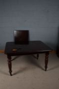 Victorian mahogany extending dining table, with chamfered corners and raised on ring turned legs and