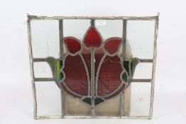 Stained glass panel, centred with a flower (AF) 52cm wide, 45cm high