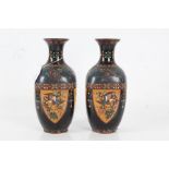 Pair of Japanese cloisonne vases, Meiji period, with foliate decoration within a shield shaped