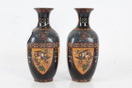 Pair of Japanese cloisonne vases, Meiji period, with foliate decoration within a shield shaped