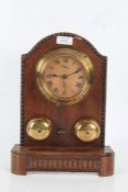 1920's/30's brass cased clock, having dial with black roman numerals and two subsidiary dials, the
