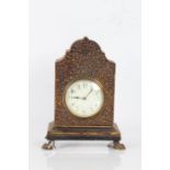 19th century chinoiserie mantel clock, the eastern style case with gilt swirls on a black