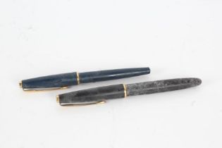 Two Parker fountain pens, the first in black with 14k gold nib, the second in blue (2)