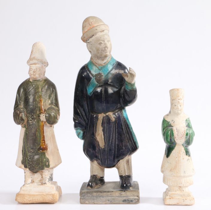 Chinese pottery "Tomb" figures, all Ming Dynasty, to include a standing figure with glazed jacket,