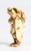 Japanese ivory netsuke, Meiji period, carved as a dancing Shishi, 45mm high