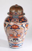 A large Japanese Imari vase and cover, the domed cover (AF) above a baluster body decorated in the