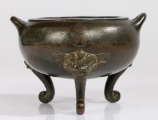 Japanese bronze censer, Meiji period, the circular body with looped handles above a hatched design